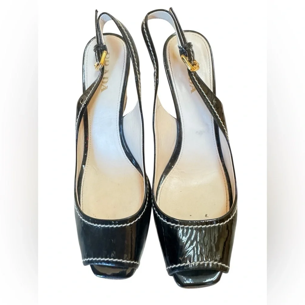 Prada Patent leather Black open toe and raffia platform with ankle strap.